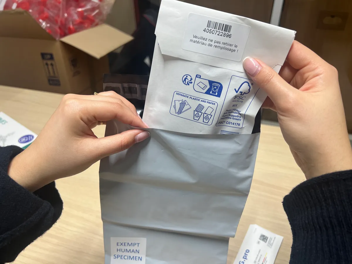 Placing in the plastic shipping packaging